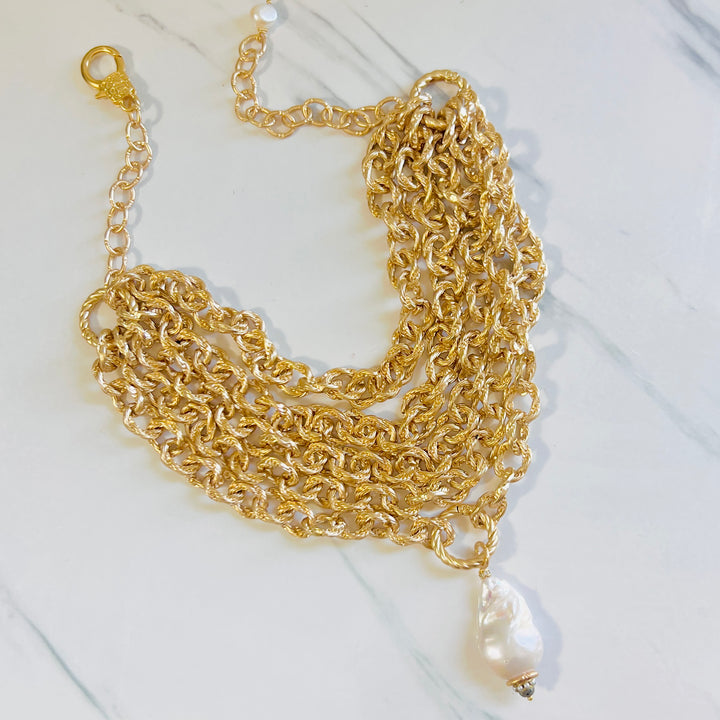 Maxine Five Strand Gold Statement Necklace with Large Baroque Pearl